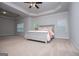 Spacious main bedroom featuring trey ceiling and windows at 137 River Birch Dr, Carrollton, GA 30116