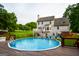 Large pool and deck in a beautiful backyard at 855 Hood Rd, Fayetteville, GA 30214
