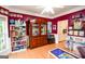 Large bonus room with hardwood floors and natural light, perfect for crafting and playing at 855 Hood Rd, Fayetteville, GA 30214