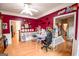 Bright bonus room with hardwood floors and ample space for activities at 855 Hood Rd, Fayetteville, GA 30214
