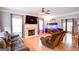 Comfortable living room with fireplace, hardwood floors, and ample seating at 855 Hood Rd, Fayetteville, GA 30214