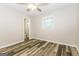 Comfortable bedroom with ample natural light, a ceiling fan, and stylish floors at 338 Mount Zion Rd, Hapeville, GA 30354
