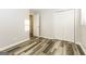 This bedroom offers updated flooring, walk-in closet, and ample natural light at 338 Mount Zion Rd, Hapeville, GA 30354