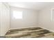 This bedroom offers updated flooring, double door closet, and ample natural light at 338 Mount Zion Rd, Hapeville, GA 30354