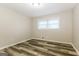 This bedroom offers updated flooring, recessed lighting, and ample natural light at 338 Mount Zion Rd, Hapeville, GA 30354