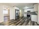 Bright kitchen with stainless steel appliances and easy access to living room at 338 Mount Zion Rd, Hapeville, GA 30354