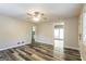 Open living room showcasing a ceiling fan and attractive flooring at 338 Mount Zion Rd, Hapeville, GA 30354