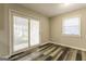 Well-lit living room with modern floors and access to a large backyard at 338 Mount Zion Rd, Hapeville, GA 30354