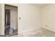 An unfurnished bedroom shows exposed flooring, electrical outlets, and plain walls at 8005 Big Rock Dr, Douglasville, GA 30134