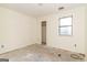 Interior shot of a bedroom in renovation process with closet and a window at 8005 Big Rock Dr, Douglasville, GA 30134