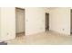 Spacious bedroom featuring a closet and a window in an unfinished renovation project at 8005 Big Rock Dr, Douglasville, GA 30134