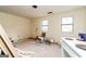 Room under renovation with an open view to the door and a vintage white stove at 8005 Big Rock Dr, Douglasville, GA 30134