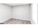 Bright bedroom featuring wood-look flooring and a bright window offering natural light at 2730 Pine Log Way, Buford, GA 30519