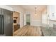Open kitchen area with stainless appliances, granite countertops and a breakfast nook at 2730 Pine Log Way, Buford, GA 30519