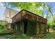 Elevated wooden deck on a brick home overlooking a private, treed backyard at 1749 Creat Se Trl, Smyrna, GA 30080