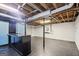 Spacious unfinished basement with exposed ceiling, painted walls, and concrete floor at 1749 Creat Se Trl, Smyrna, GA 30080