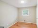 Bedroom with wood floors, white walls and natural light at 1749 Creat Se Trl, Smyrna, GA 30080