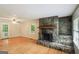 Open living space with hardwood floors and stone fireplace at 1749 Creat Se Trl, Smyrna, GA 30080