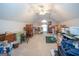 Spacious bonus room with a sloped ceiling, carpet, and lots of space for storage at 215 Barrington Grange Dr, Sharpsburg, GA 30277