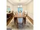Formal dining room features a large table, plenty of seating, and natural light at 4710 Kinsmon Pl, Marietta, GA 30062