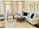 Cozy living room with natural light, neutral tones, and ample seating at 4710 Kinsmon Pl, Marietta, GA 30062