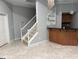 Finished basement features recessed lighting, a bar area, and open space at 4710 Kinsmon Pl, Marietta, GA 30062