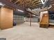Spacious unfinished basement with brickwork, offering potential for future customization at 95 Fern Ct, Stockbridge, GA 30281