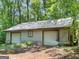 Spacious outbuilding with multiple garage doors offering ample storage and workspace at 95 Fern Ct, Stockbridge, GA 30281
