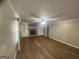 Comfortable living room with a brick fireplace and built-in bookshelves at 780 Sweet Briar Se Trl, Conyers, GA 30094