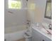 Basic full bathroom with tub and shower, presenting a blank canvas for future updates at 1391 Peachcrest Rd, Decatur, GA 30032
