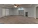 Finished basement featuring neutral paint, carpeted floors, recessed lighting, and a ceiling fan at 135 Magnolia Dr, Oxford, GA 30054