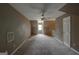 Bedroom with carpeted floors, dormer window and a ceiling fan for comfort and energy efficiency at 135 Magnolia Dr, Oxford, GA 30054