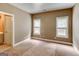 Bright bedroom with carpet and windows offers a relaxing space at 135 Magnolia Dr, Oxford, GA 30054