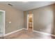 Bedroom with carpet, natural light and an ensuite bathroom offers comfort and privacy at 135 Magnolia Dr, Oxford, GA 30054