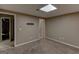 Bedroom with neutral carpet, outlets, and paint at 135 Magnolia Dr, Oxford, GA 30054