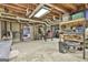 Spacious basement with exposed wood framing and concrete floor at 180 Willow Lake Ln, Sharpsburg, GA 30277