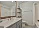 Bathroom featuring a single vanity and shower-tub combo at 180 Willow Lake Ln, Sharpsburg, GA 30277