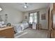 Bedroom with neutral colored walls and carpet flooring at 180 Willow Lake Ln, Sharpsburg, GA 30277