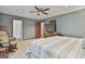 Bedroom boasts neutral walls, soft carpeting, and plenty of natural light at 180 Willow Lake Ln, Sharpsburg, GA 30277