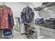 Walk-in closet with shelving and clothing racks at 180 Willow Lake Ln, Sharpsburg, GA 30277