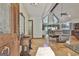 Sunlit foyer with high ceilings and an open floor plan leading to the dining and living spaces at 180 Willow Lake Ln, Sharpsburg, GA 30277