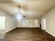 Bright living room featuring wood-look floors, neutral walls and a ceiling fan at 221 Courthouse Park Dr, Temple, GA 30179