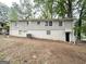 Backyard of a brick home, showcasing the yard and back entrance at 1814 Mary Lou Se Ln, Atlanta, GA 30316