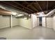 Unfinished basement with ductwork, concrete floor, and access to other rooms at 1814 Mary Lou Se Ln, Atlanta, GA 30316