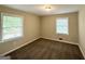 Cozy bedroom with plush carpeting, bright windows, and neutral walls at 1814 Mary Lou Se Ln, Atlanta, GA 30316