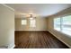 Bright, open living room featuring hardwood floors, ceiling fan and lots of natural light at 1814 Mary Lou Se Ln, Atlanta, GA 30316