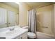 Standard bathroom with white vanity, matching toilet and shower/tub combination at 4511 Ravenwood Pl # 70, Union City, GA 30291
