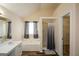Light filled bathroom boasts dual sinks and a separate shower and soaking tub at 4511 Ravenwood Pl # 70, Union City, GA 30291
