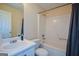 Clean bathroom with a tub and shower combination, and a white vanity at 4511 Ravenwood Pl # 70, Union City, GA 30291