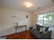 Cozy bedroom with hardwood floors, natural light, and comfortable seating at 4511 Ravenwood Pl # 70, Union City, GA 30291